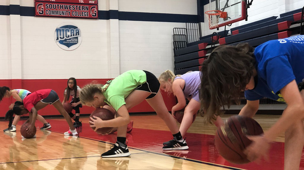 Girls participating in a past Spartan basketball camp