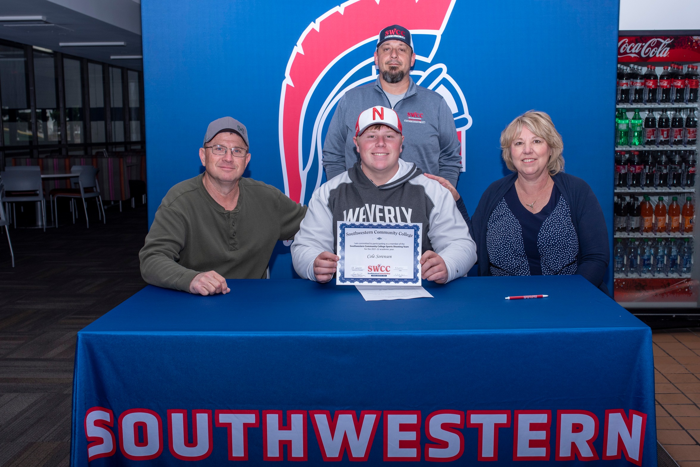 Cole Sorensen signs his National Letter of Intent to join the Southwestern sports shooting team in the fall. Sorensen is joined by his parents Dudley and Jichelle, as well as Southwestern Sports Shooting Coach Josh Purdy.