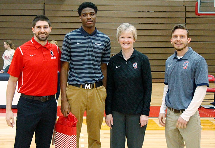 Pictured (L to R): Jordan Strofaci, SWCC head track and field coach; Ronald Henderson, Jr.; Dr. Barb Crittenden, SWCC president; and Trey Bruton, SWCC assistant track and field coach.