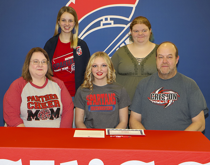 Front row (L to R): Heather Orr, Hallie's mother; Hallie Orr; and Glenn Orr, Hallie's father. Back row: Paige Busch, Southwestern dance coach, and Jenna Orr, Hallie's sister.