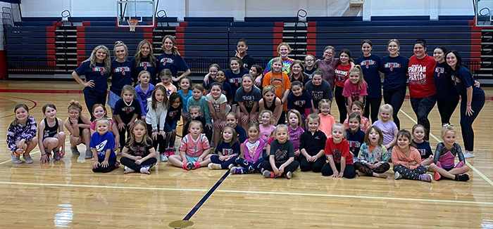 Participants and dance team at a previous dance camp