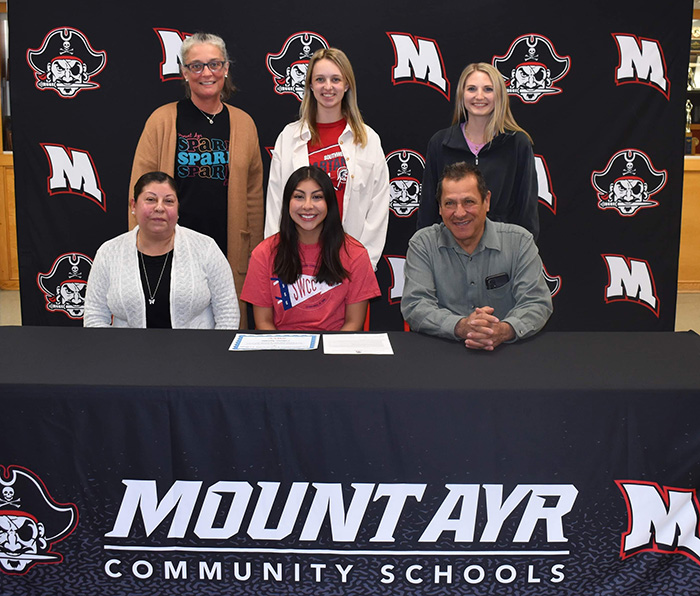 Sitting (L to R): Martina Preciado, Liliana?s mother; Liliana Aguilar; and Julian Aguilar, Liliana?s father. 
Standing: Sarah McAlexander, Mt. Ayr High School dance coach; Paige Russo, Southwestern head dance coach; and Ryann Martin, Mt. Ayr High School dance coach.
