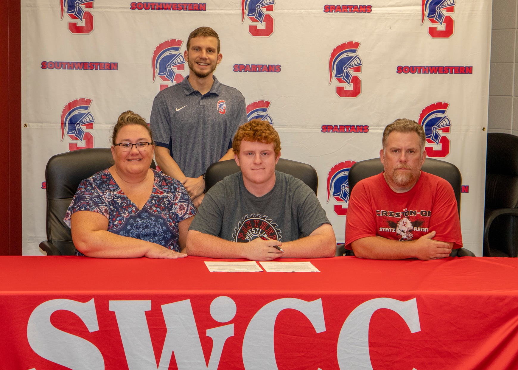Kendall Crawford of Creston signs his National Letter of Intent to join the Southwestern track and field team for the 2019-20 season.