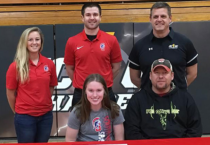 PICTURED: Sitting (L to R) – Savana Fuller and Shane Fuller, Savana’s father. Standing – Mallory McArtor, Southwestern assistant softball coach; Nick Weinmeister, Southwestern head softball coach; and Tim O’Brien, ACGC High School head softball coach.