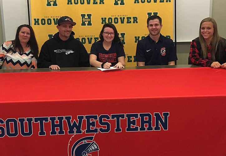 PICTURED (L to R): Anna Redeker, Jordan’s mother; JR Redeker, Jordan’s father; Jordan Redeker; Nick Weinmeister, Southwestern head softball coach; and Missie Feuerbach, Des Moines Hoover softball coach.