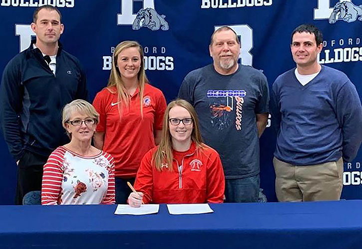 PICTURED (L to R): Front row - Rhonda Russell, Makinna’s mother, and Makinna Russell. Back row – Dan Musich, Bedford High School softball coach; Mallory McArtor, Southwestern assistant softball coach; Jeff Russell, Makinna’s father; and Matt Ambrose, Bedford High School athletic director.
