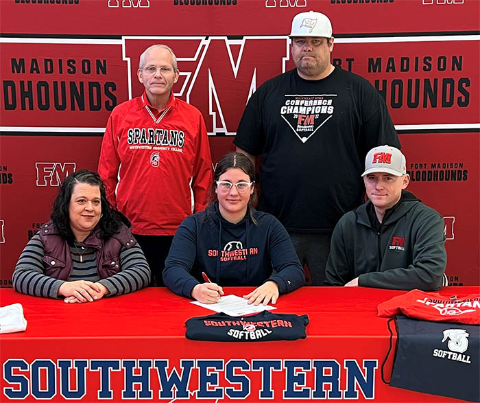 Pictured (L to R): Sitting ? Michelle Kruse, Erika?s mother; Erika Kruse; and Jared Rhem, Fort Madison High School head softball coach.
Standing ? Danny Jensen, SWCC head softball coach, and Nick Kruse, Erika?s father.