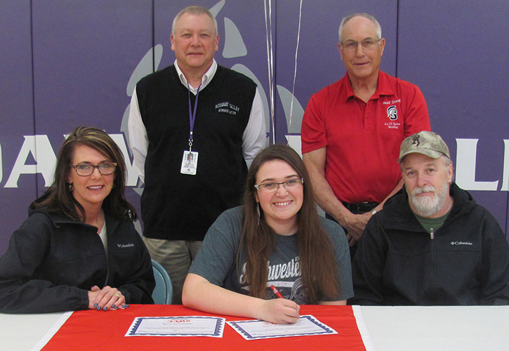In photo (L to R):  Sitting - Brook Lilly, MaKenna’s mother; MaKenna Lilly; and Rich Lilly, MaKenna’s father. Standing: Lanny Kliefoth, Nodaway Valley High School principal, and Marc Roberg, SWCC sports shooting coach.