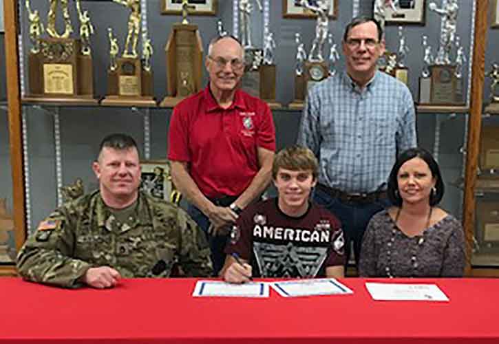 In photo (L to R):  Sitting – Jesse Rudolph, Carter’s stepfather; Carter Griffin; and Jeanna Rudolph, Carter’s stepmother. Standing - Marc Roberg, Southwestern head sports shooting coach, and Lleland Kaughman.