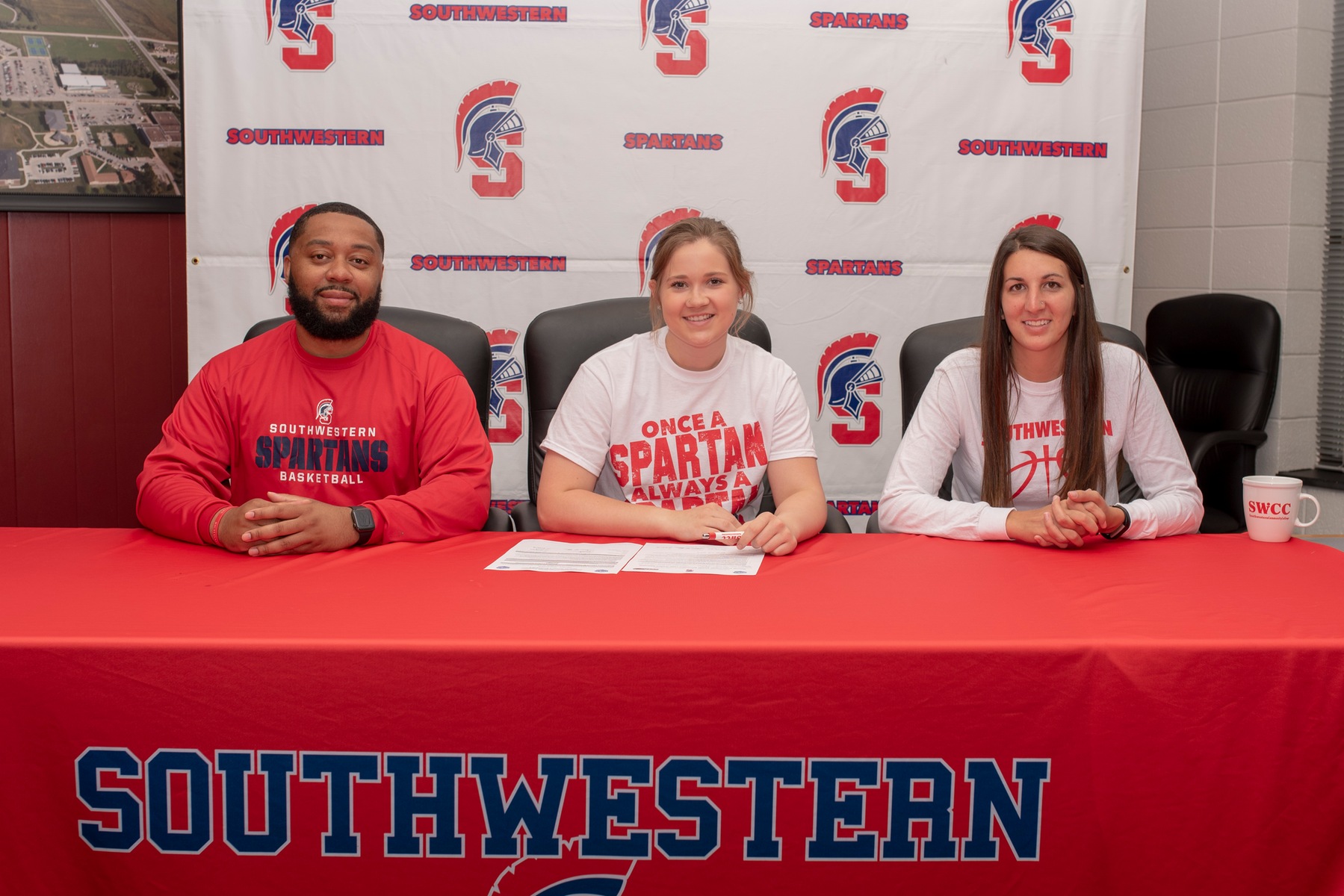 Samantha Hagedorn signs her National Letter of Intent to play basketball at Southwestern Community College next year.