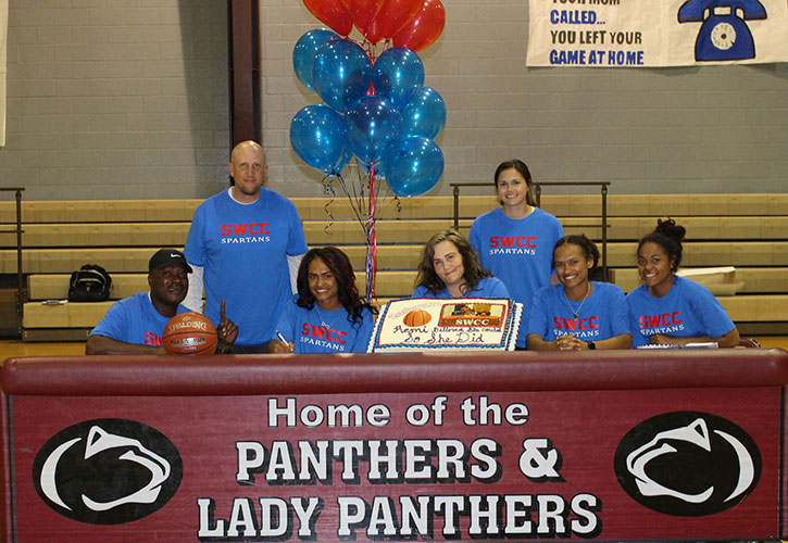 Front row – Robert Haynes, Remie’s father; Remie Haynes; Melanie Haynes, Remie’s mother; Reis Haynes, Remie’s sister; and Triana McGee, Remie’s sister. Back row – Doug Hunt and Shawna Monreal, Seymour High School coaches.