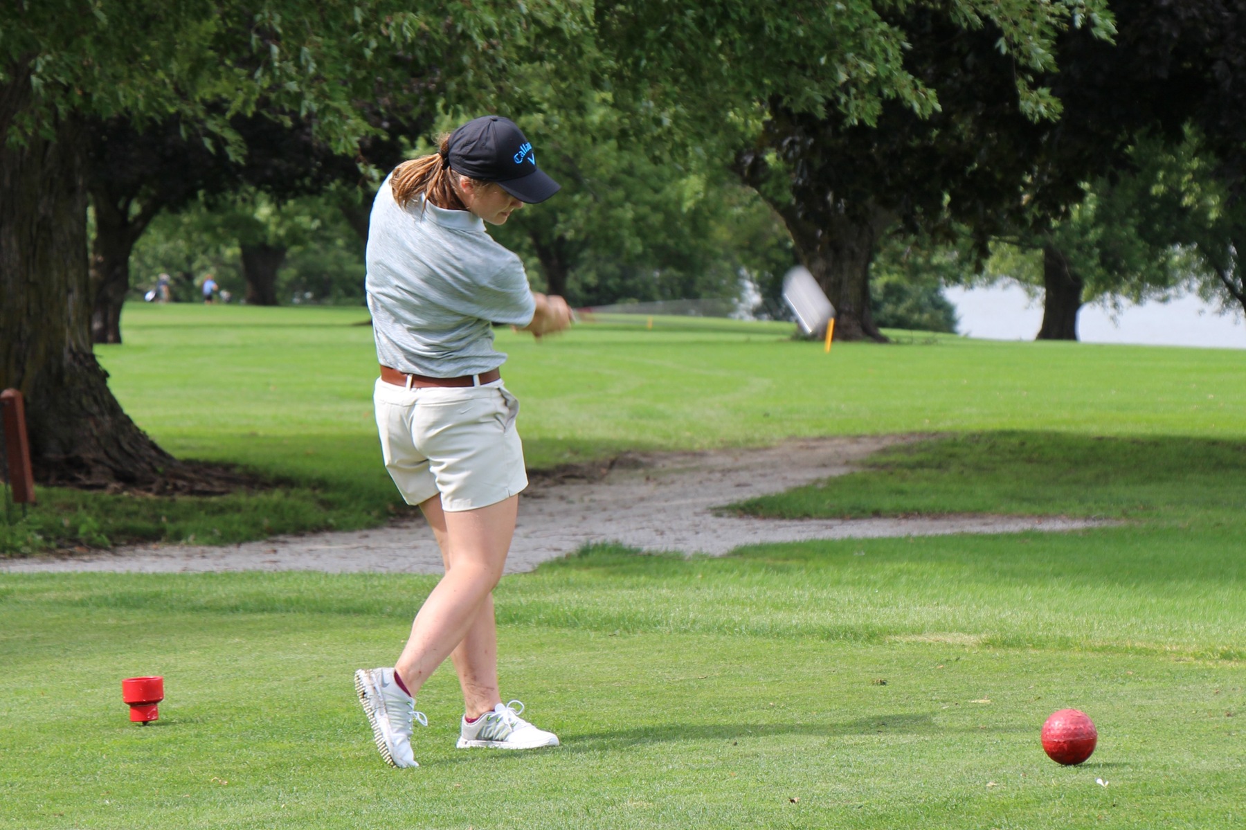 Freshman from Lenox, Iowa, Katelyn Belding teeing off for the Spartans.
