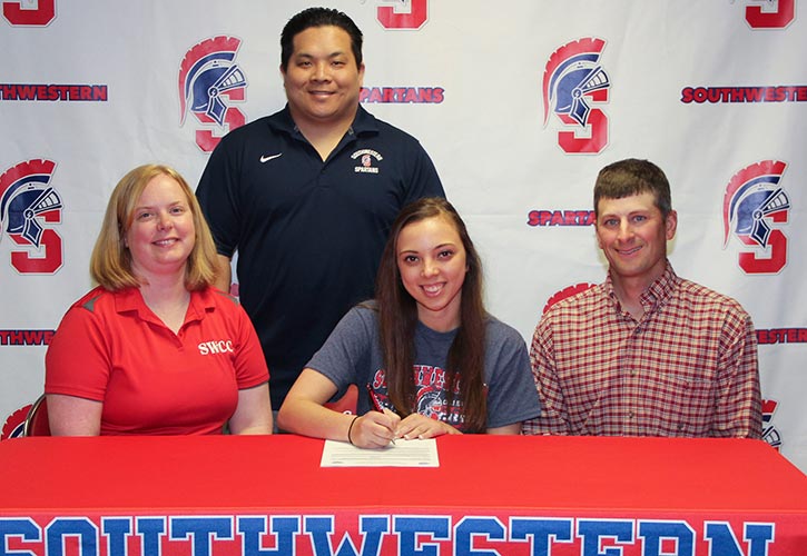 Pictured (L to R): Sitting – Julie Wallace, Halee’s mother; Halee Wallace; and Doug Wallace, Halee’s father. Standing - Casey Quiggle, Southwestern head volleyball coach.