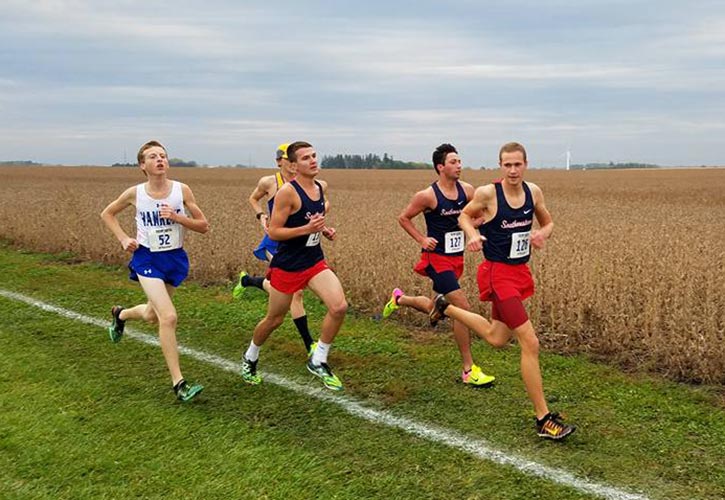 Spartan runners Pheonix Shadden, Kevin Detrich, and Shane Breheny running at the Trent Smith Invite